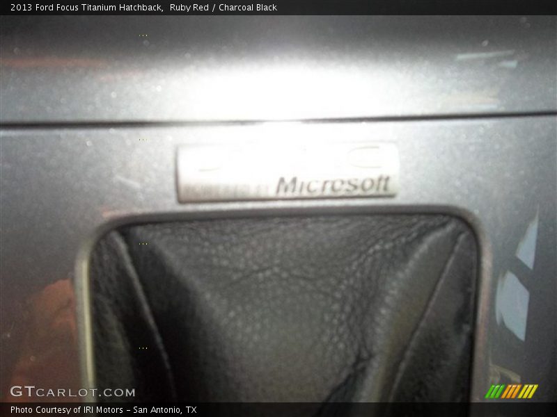 Ruby Red / Charcoal Black 2013 Ford Focus Titanium Hatchback