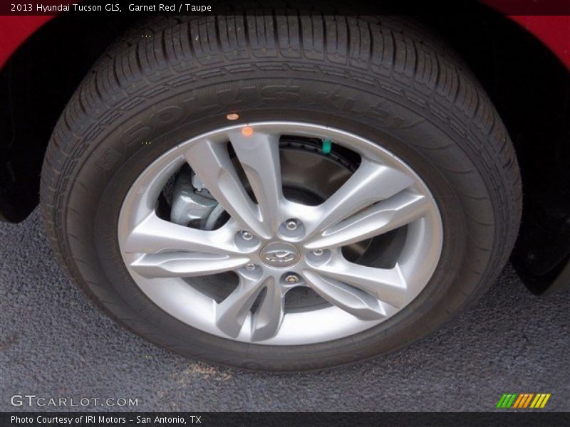 Garnet Red / Taupe 2013 Hyundai Tucson GLS