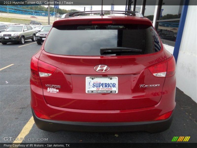 Garnet Red / Taupe 2013 Hyundai Tucson GLS