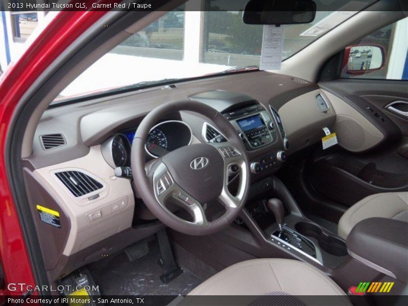 Garnet Red / Taupe 2013 Hyundai Tucson GLS