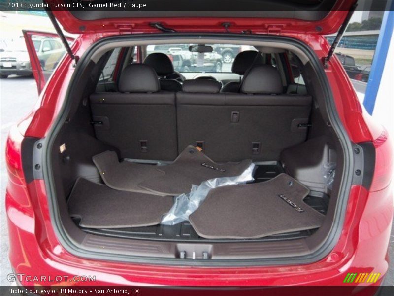 Garnet Red / Taupe 2013 Hyundai Tucson GLS
