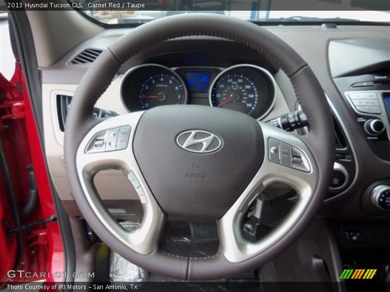 Garnet Red / Taupe 2013 Hyundai Tucson GLS