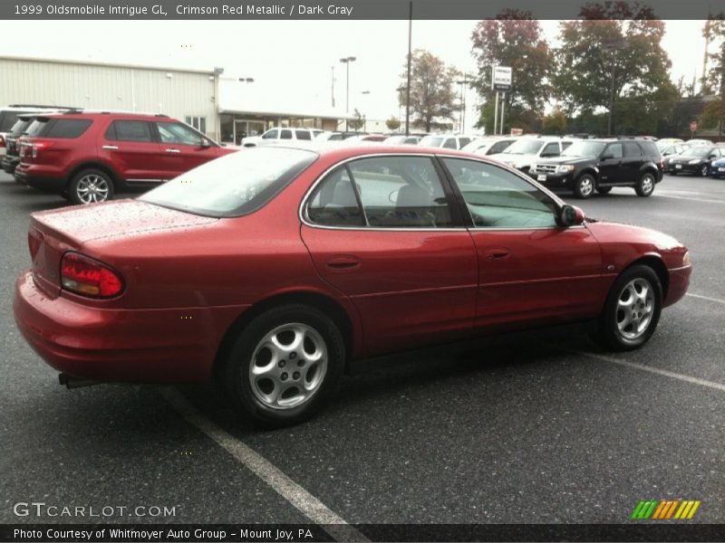 Crimson Red Metallic / Dark Gray 1999 Oldsmobile Intrigue GL