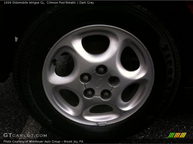 Crimson Red Metallic / Dark Gray 1999 Oldsmobile Intrigue GL