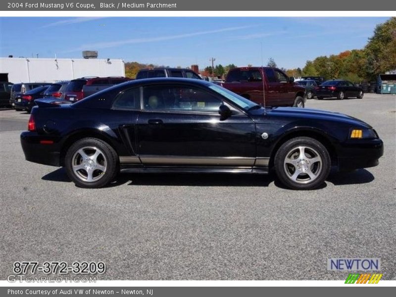 Black / Medium Parchment 2004 Ford Mustang V6 Coupe