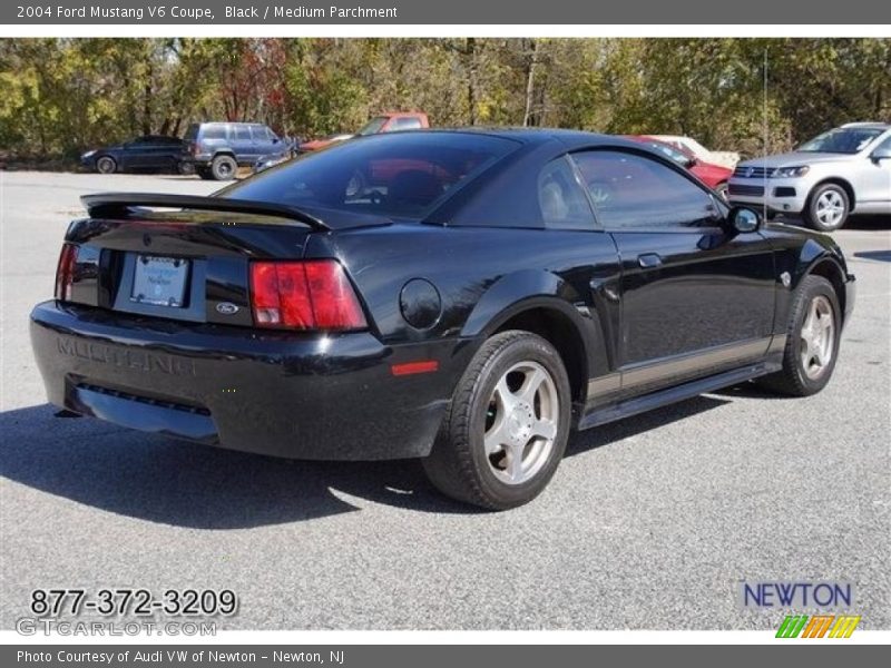 Black / Medium Parchment 2004 Ford Mustang V6 Coupe