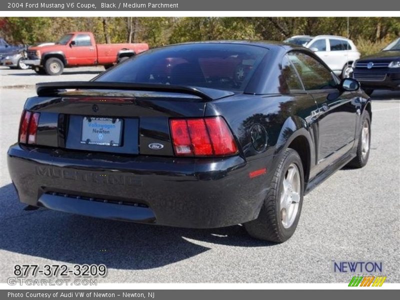 Black / Medium Parchment 2004 Ford Mustang V6 Coupe