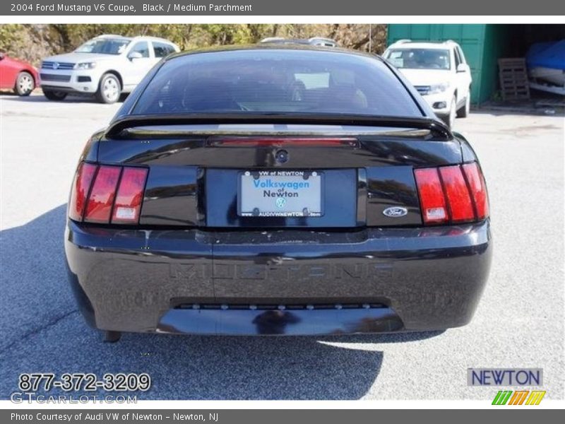 Black / Medium Parchment 2004 Ford Mustang V6 Coupe