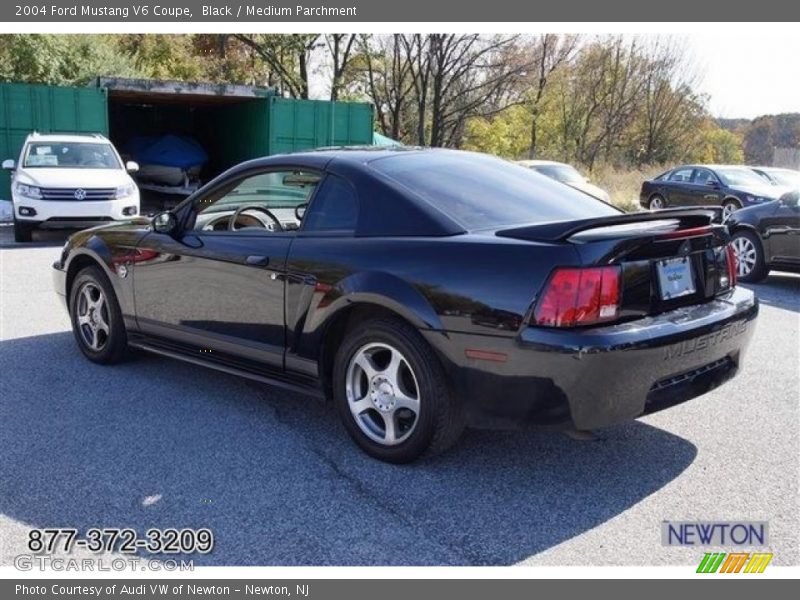 Black / Medium Parchment 2004 Ford Mustang V6 Coupe