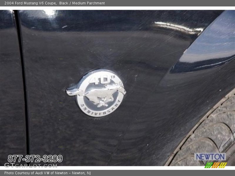 Black / Medium Parchment 2004 Ford Mustang V6 Coupe