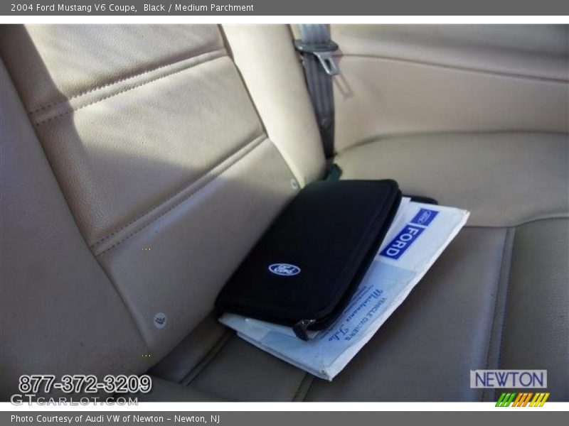 Black / Medium Parchment 2004 Ford Mustang V6 Coupe