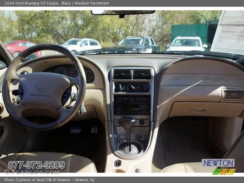 Black / Medium Parchment 2004 Ford Mustang V6 Coupe