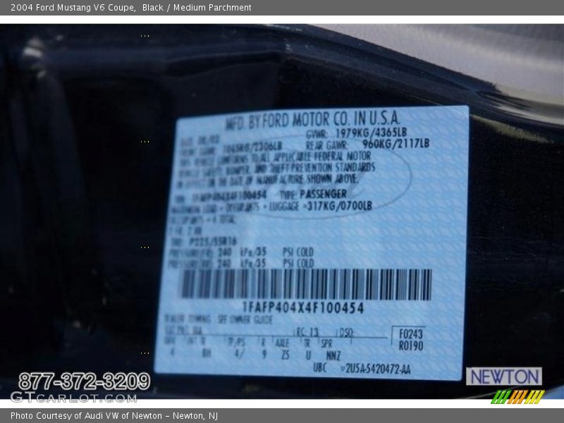 Black / Medium Parchment 2004 Ford Mustang V6 Coupe