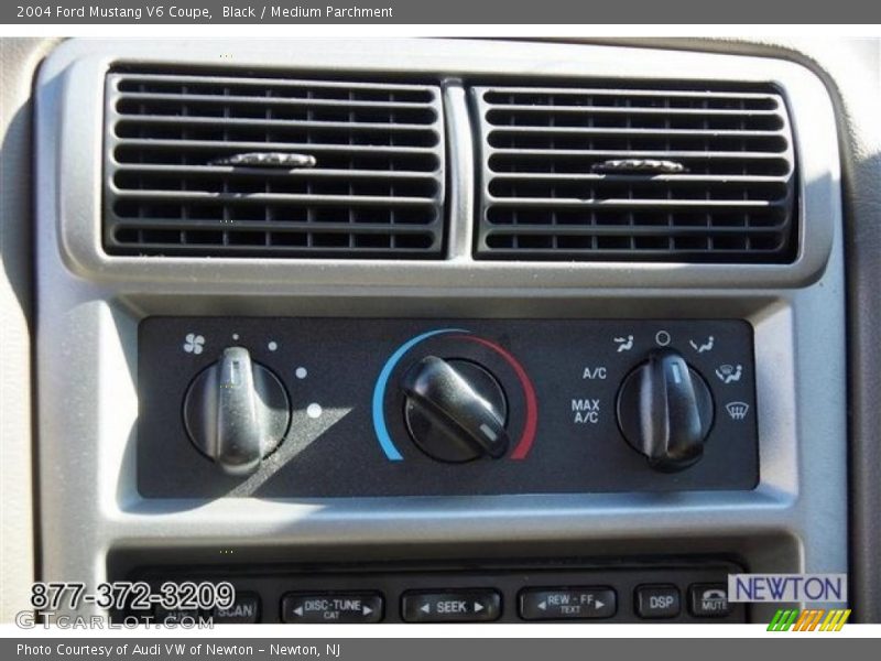 Black / Medium Parchment 2004 Ford Mustang V6 Coupe