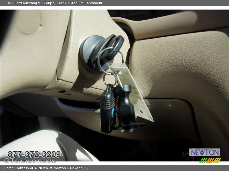 Black / Medium Parchment 2004 Ford Mustang V6 Coupe