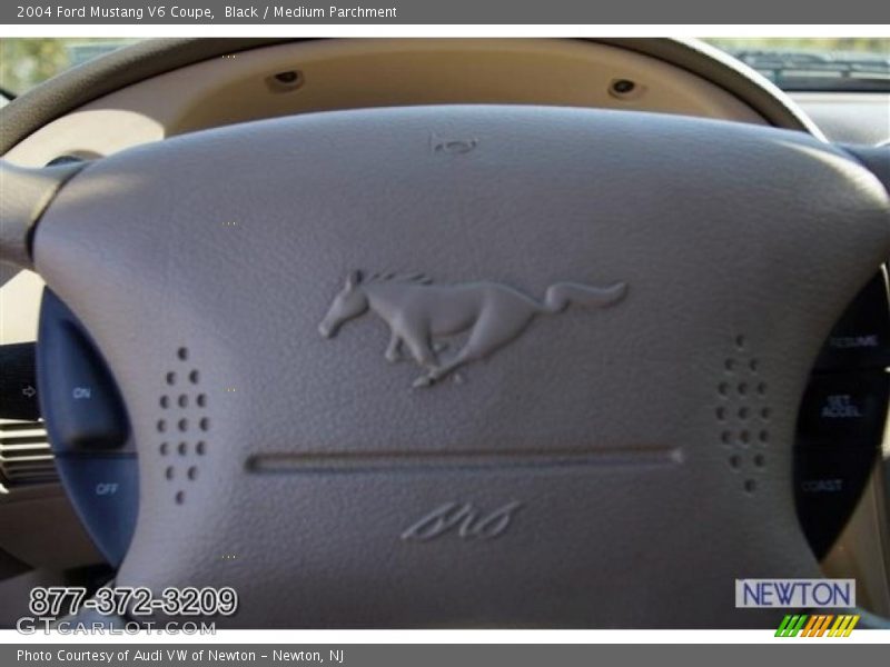Black / Medium Parchment 2004 Ford Mustang V6 Coupe