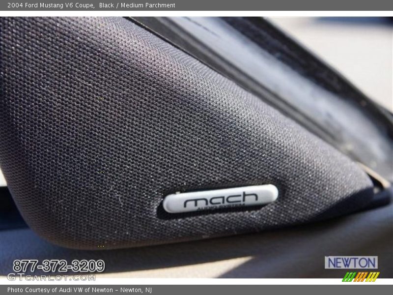 Black / Medium Parchment 2004 Ford Mustang V6 Coupe