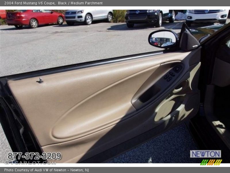 Black / Medium Parchment 2004 Ford Mustang V6 Coupe