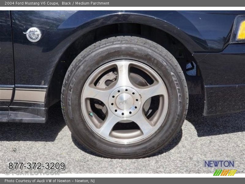 Black / Medium Parchment 2004 Ford Mustang V6 Coupe