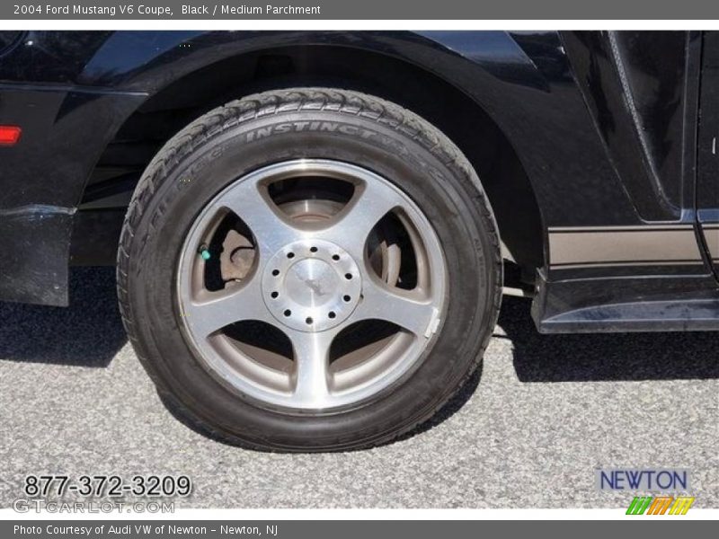 Black / Medium Parchment 2004 Ford Mustang V6 Coupe