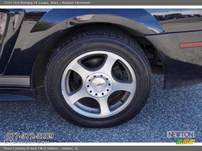 Black / Medium Parchment 2004 Ford Mustang V6 Coupe