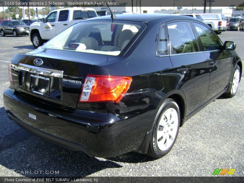 Obsidian Black Pearl / Ivory 2010 Subaru Impreza 2.5i Sedan