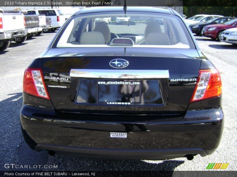 Obsidian Black Pearl / Ivory 2010 Subaru Impreza 2.5i Sedan