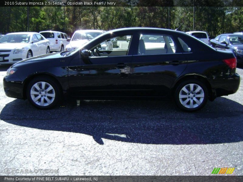 Obsidian Black Pearl / Ivory 2010 Subaru Impreza 2.5i Sedan