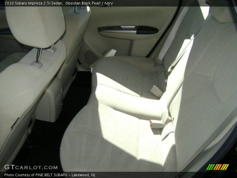 Obsidian Black Pearl / Ivory 2010 Subaru Impreza 2.5i Sedan