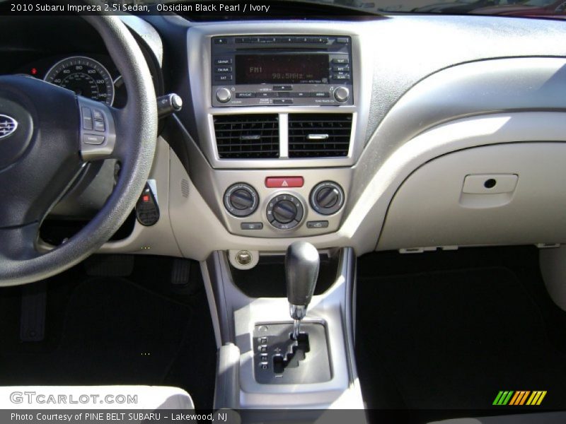 Obsidian Black Pearl / Ivory 2010 Subaru Impreza 2.5i Sedan