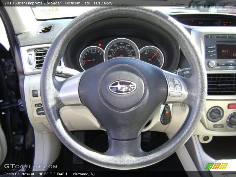 Obsidian Black Pearl / Ivory 2010 Subaru Impreza 2.5i Sedan