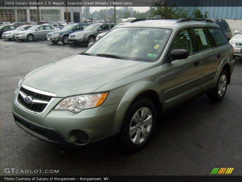 Seacrest Green Metallic / Warm Ivory 2009 Subaru Outback 2.5i Wagon