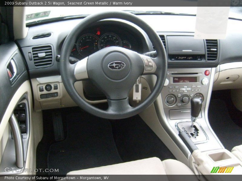 Seacrest Green Metallic / Warm Ivory 2009 Subaru Outback 2.5i Wagon