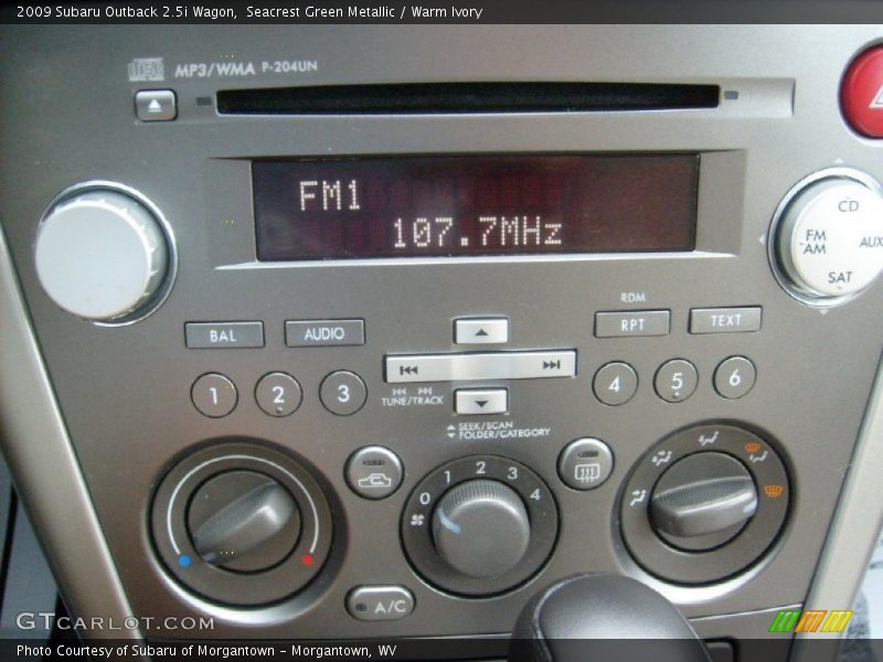 Seacrest Green Metallic / Warm Ivory 2009 Subaru Outback 2.5i Wagon