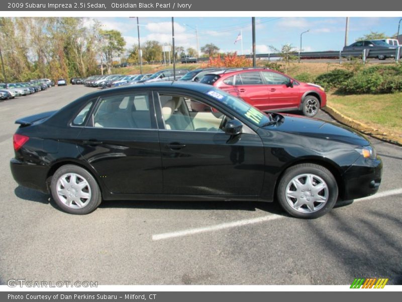 Obsidian Black Pearl / Ivory 2009 Subaru Impreza 2.5i Sedan