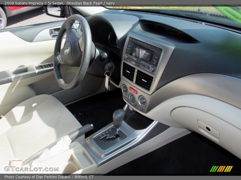 Obsidian Black Pearl / Ivory 2009 Subaru Impreza 2.5i Sedan