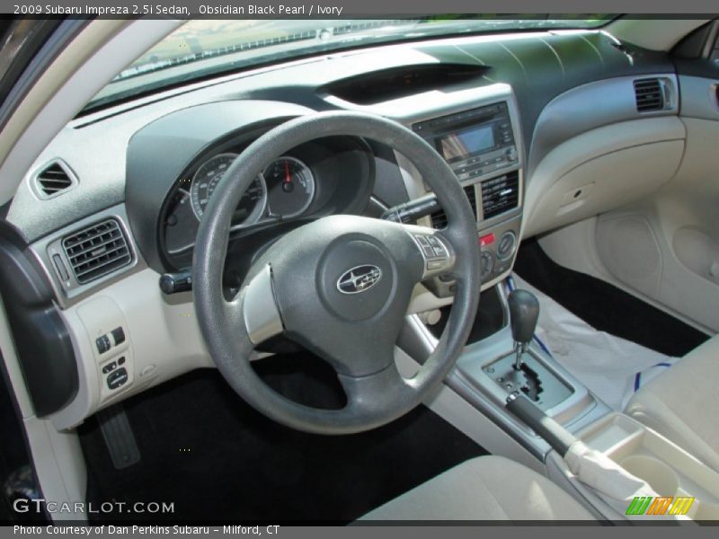 Obsidian Black Pearl / Ivory 2009 Subaru Impreza 2.5i Sedan