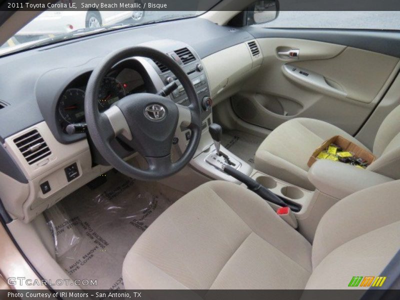 Sandy Beach Metallic / Bisque 2011 Toyota Corolla LE