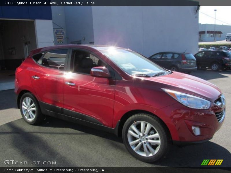 Garnet Red / Taupe 2013 Hyundai Tucson GLS AWD