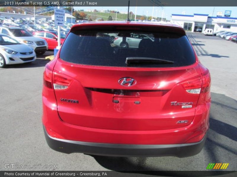 Garnet Red / Taupe 2013 Hyundai Tucson GLS AWD