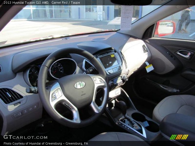 Garnet Red / Taupe 2013 Hyundai Tucson GLS AWD
