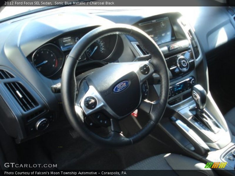 Sonic Blue Metallic / Charcoal Black 2012 Ford Focus SEL Sedan