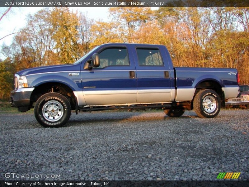 Sonic Blue Metallic / Medium Flint Grey 2003 Ford F250 Super Duty XLT Crew Cab 4x4