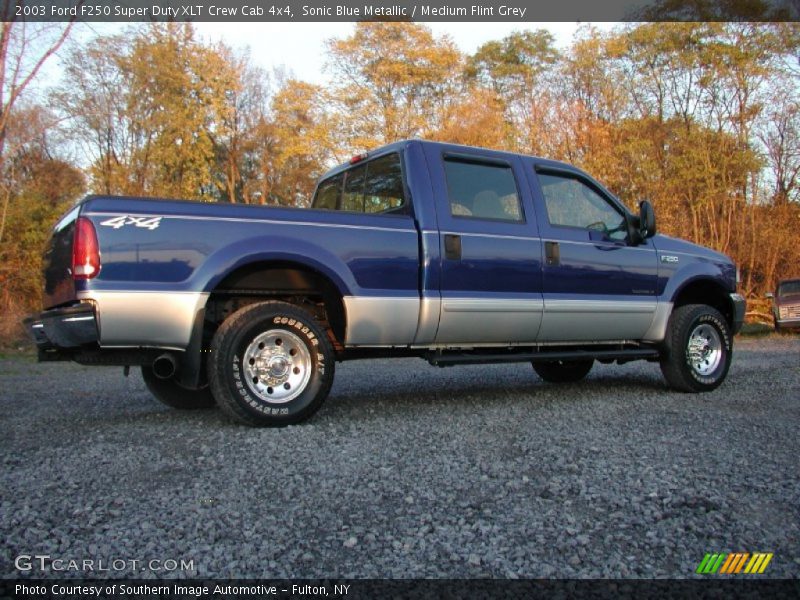 Sonic Blue Metallic / Medium Flint Grey 2003 Ford F250 Super Duty XLT Crew Cab 4x4