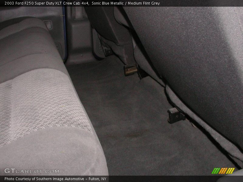 Sonic Blue Metallic / Medium Flint Grey 2003 Ford F250 Super Duty XLT Crew Cab 4x4
