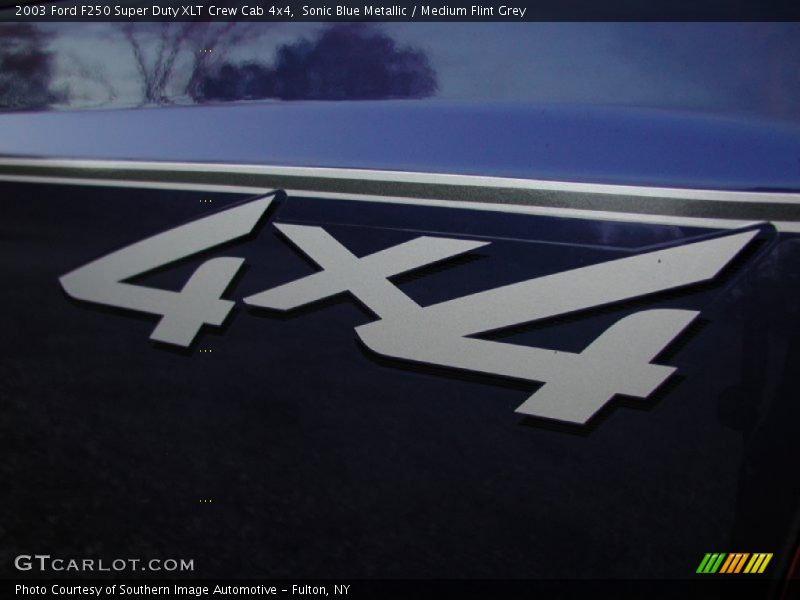 Sonic Blue Metallic / Medium Flint Grey 2003 Ford F250 Super Duty XLT Crew Cab 4x4