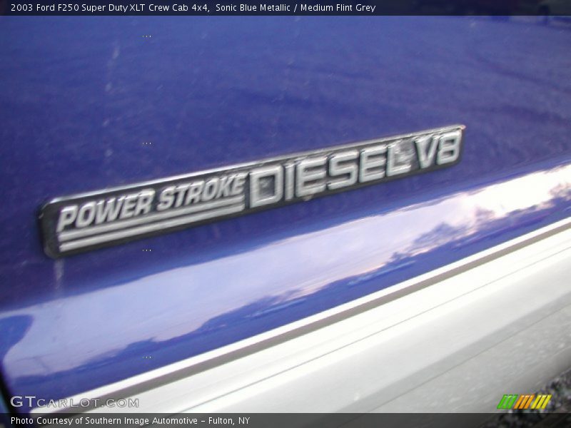 Sonic Blue Metallic / Medium Flint Grey 2003 Ford F250 Super Duty XLT Crew Cab 4x4