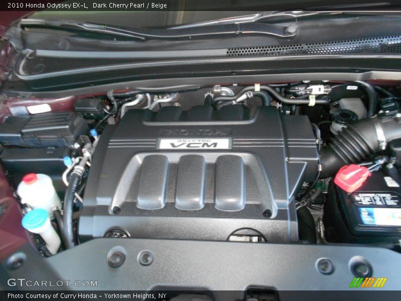 Dark Cherry Pearl / Beige 2010 Honda Odyssey EX-L