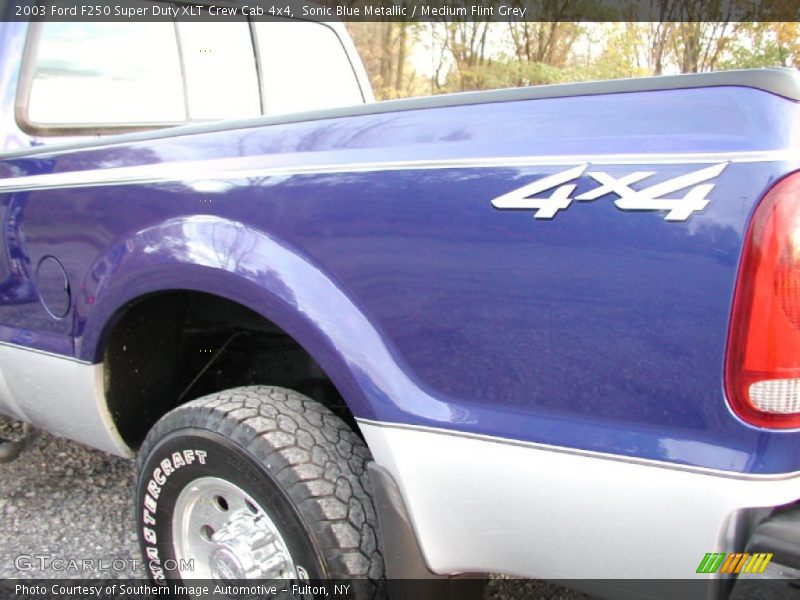 Sonic Blue Metallic / Medium Flint Grey 2003 Ford F250 Super Duty XLT Crew Cab 4x4