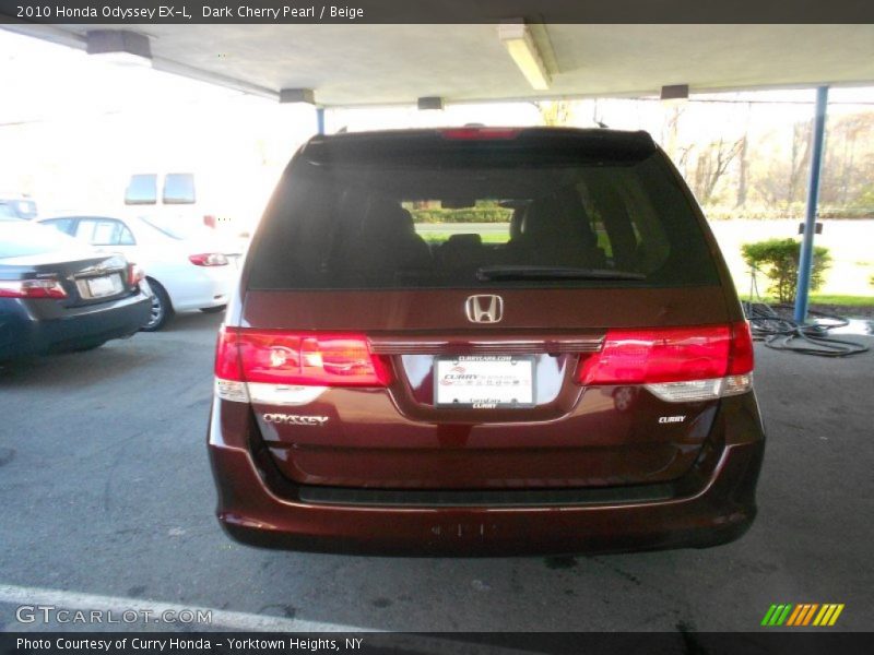 Dark Cherry Pearl / Beige 2010 Honda Odyssey EX-L